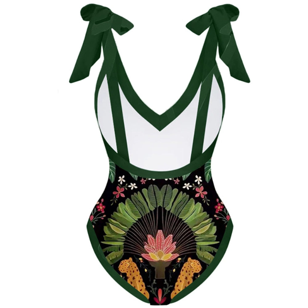 Make a splash in style with our Green Vintage One Piece Retro Swimsuit. Channel retro vibes and enjoy ultimate comfort at the beach. Shop today for a classic look.